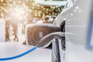 Electric,Vehicle,Charging,Station,For,Home,With,Ev,Car,Background
