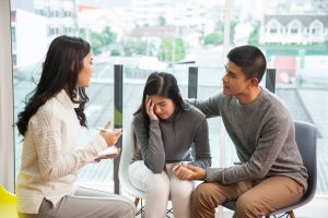 Young,Family,At,A,Reception,Of,Psychologist