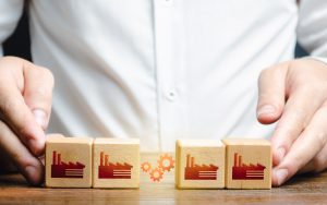 Businessman,Arranges,Work,Between,Factory,Productions.,Industrial,Conglomerates,And,Economic
