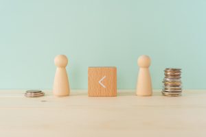 The,Gap,Between,Rich,And,Poor;,A,Wooden,Blocks,With