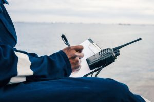 Seaman,Onboard,A,Ship,Fills,Checklist.,Paperwork,At,Sea,
